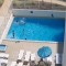Apartamento em recinto fechado com piscina